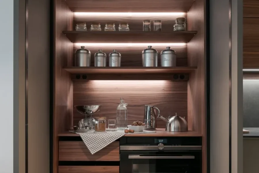 Cocina abierta al salón en gris visón y nogal Cocina abierta al salón en gris visón y nogal