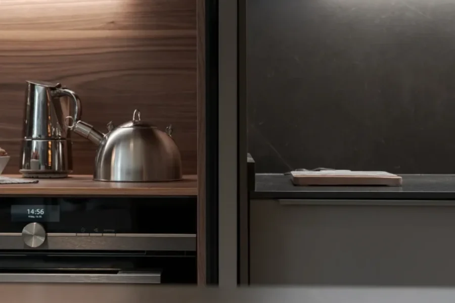 Cocina abierta al salón en gris visón y nogal Cocina abierta al salón en gris visón y nogal
