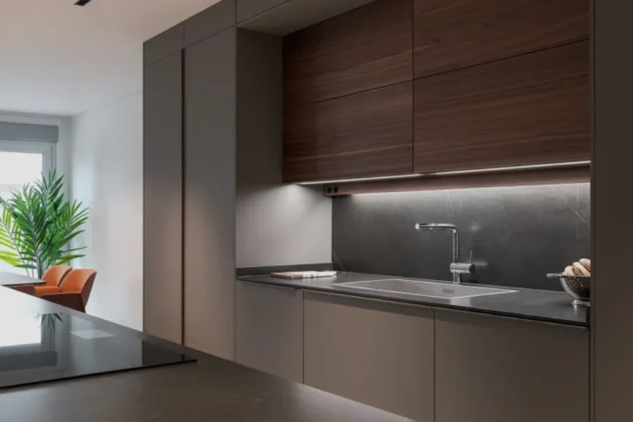 Cocina abierta al salón en gris visón y nogal Cocina abierta al salón en gris visón y nogal
